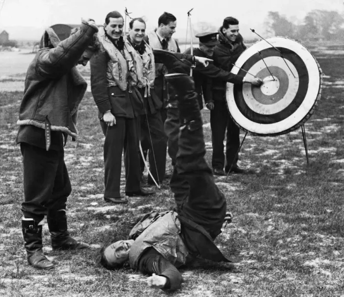 Framed Print : RAF pilots and crew enjoy some time out between missions with a round of archery at their Framed Print : RAF pilots and crew enjoy some time out between missions with a round of archery at their