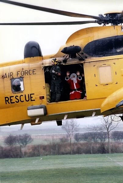 A RAF search and rescue Westland Sea King helicopter. Santa Claus