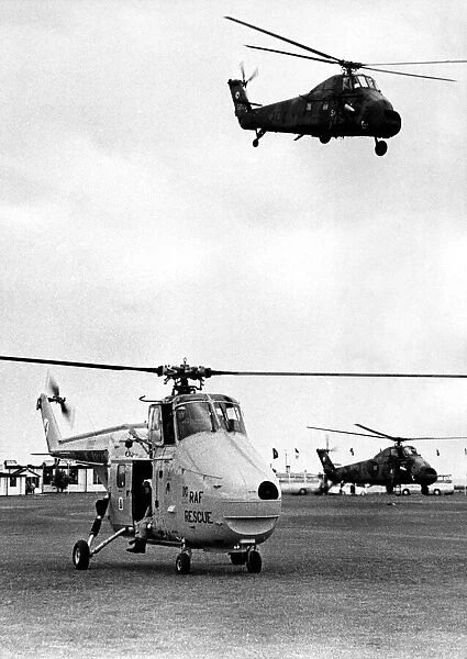 A RAF Westland Whirlwind search and rescue helicopter stands by as strike command