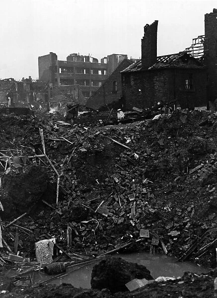 Raid damage at Hillsborough, Sheffield. Where the hole is seen in foreground stood a