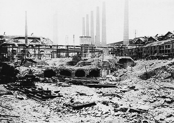 Rail centre blasted during Nazi retreat. This scene of destruction greeted