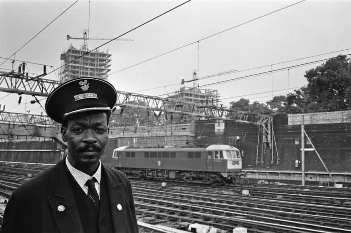 Framed Print : Railway guard seen here at Euston Station. 15th August 1966 Framed Print : Railway guard seen here at Euston Station. 15th August 1966