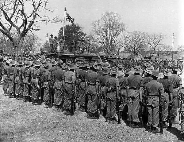 Raising the Union Jack at Fort Dufferin, Burma. 1944