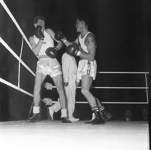Ralph Ungricht USA v Frank Taylor England seen here at a Amateur Boxing contest at