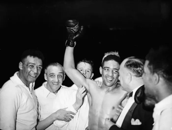 Framed Print : Randolph Turpin and his corner team celebrate his win over Sugar Ray Robinson following