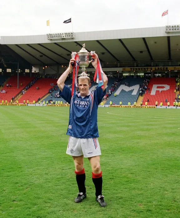Framed Print : Rangers 5 - 1 Heart of Midlothian. Gordon Durie holds up the Scottish cup after his Framed Print : Rangers 5 - 1 Heart of Midlothian. Gordon Durie holds up the Scottish cup after his