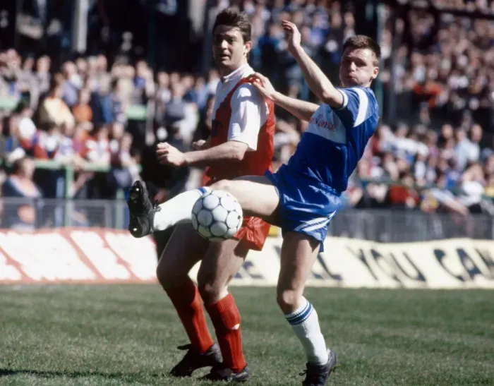 Framed Print : Rangers footballer Kevin Drinkell (left) in action against St