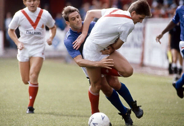 Rangers footballer Kevin Drinkell in a tangle with a player from Airdrieonians during