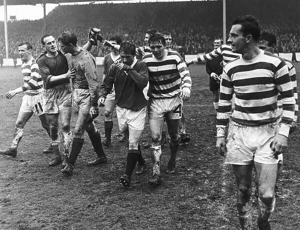 Rangers are league champions Bobby putting a comforting arm around Billy as the walk