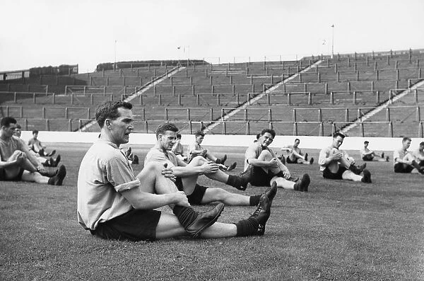 Rangers players in training session, nearest the camera is Ralph Brand the Rangers inside