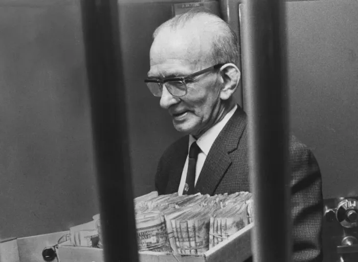 Framed Print : Rangers Pools manager Alec Paterson puts away a tray of fivers