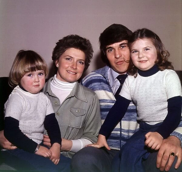 Rangers and Scotland footballer Tom Forsyth at home with his wife Linda and children