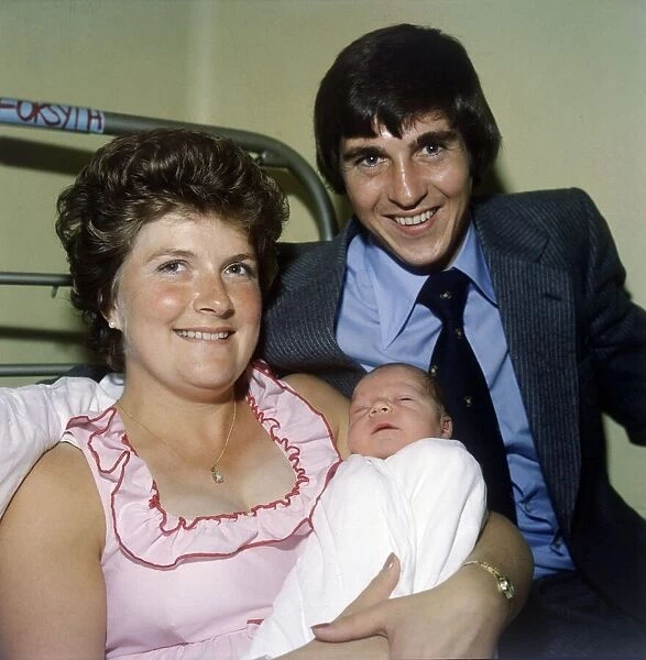 Rangers and Scotland footballer Tom Forsyth in the maternity hospital with his wife Linda