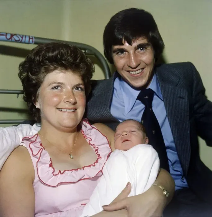 Framed Print : Rangers and Scotland footballer Tom Forsyth in the maternity hospital with his wife Linda