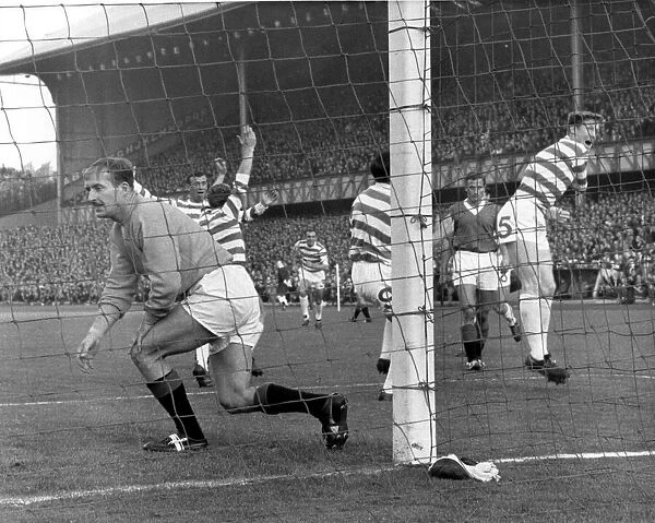 Rangers v. Celtic. Billy McNeill celebrates as Rangers keeper Billy Ritchie looks