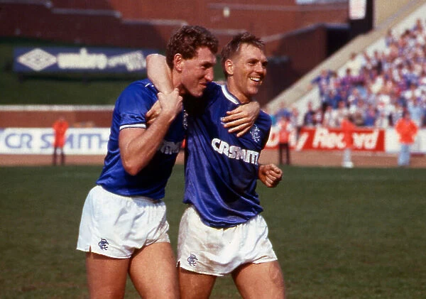 Rangers versus Hearts: Terry Butcher with arm around Graham Roberts April 1987