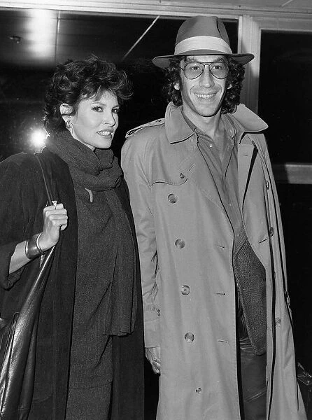Raquel Welch actress with 3rd husband Andre Weinfeld, October 1984