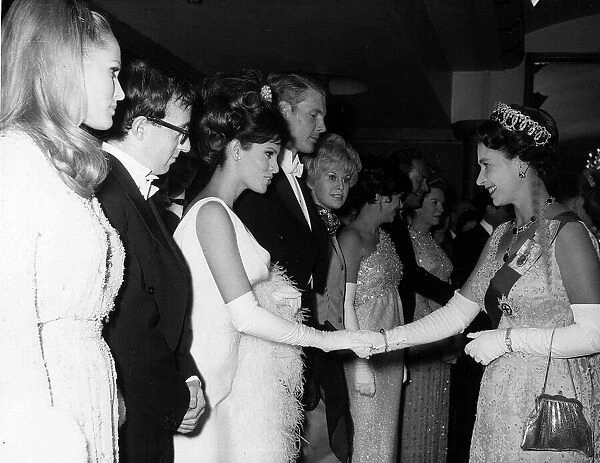 Raquel Welch meets Queen Elizabeth 1966 Woody Allen Ursula Andress