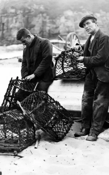 Framed Print : Ravages of the sea. Fishermen repairing crab pots on Tynemouth Haven. 12th September 1936