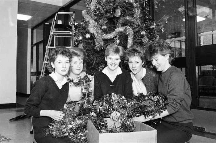 Framed Print : Rawthorpe High School pupils decorating the Christmas Tree in the entrance to St Luke Framed Print : Rawthorpe High School pupils decorating the Christmas Tree in the entrance to St Luke