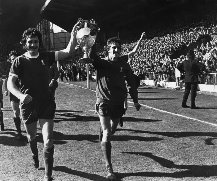 Framed Print : Ray Clemence and Larry Lloyd of Liverpool parade the League Championship trophy following Framed Print : Ray Clemence and Larry Lloyd of Liverpool parade the League Championship trophy following