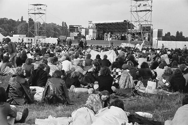 Reading Pop Festival. A group of fans listening to a group on stage at the main