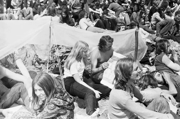 Framed Print : Reading Pop Festival. Young festival goers with their plastic sheet to protect Framed Print : Reading Pop Festival. Young festival goers with their plastic sheet to protect