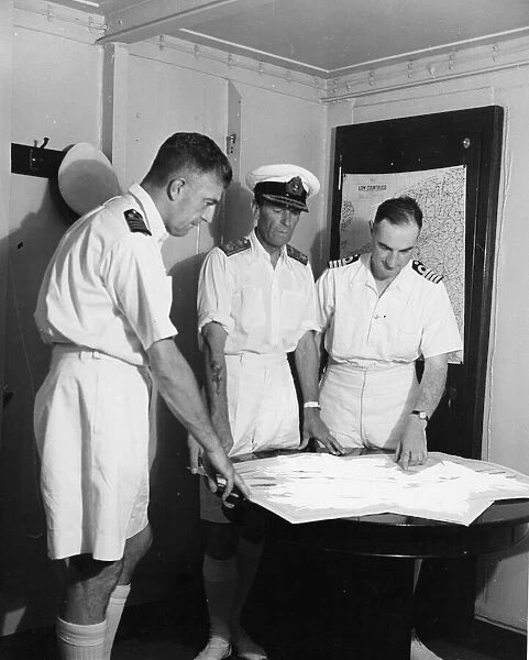 Rear Admiral Sir Philip View, DSO (centre), Captain Wright DSO and Captain Eccles (left