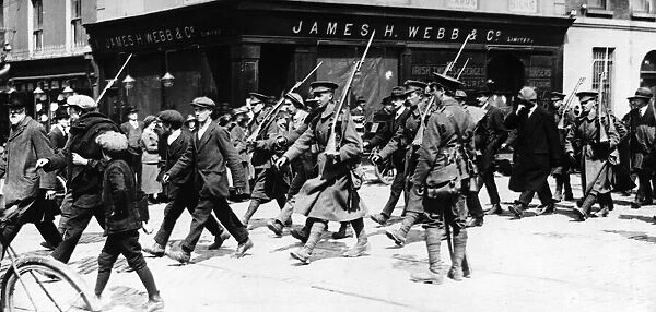 Rebel prisoners being marched out of Dublin by British Soldiers May 1916 The