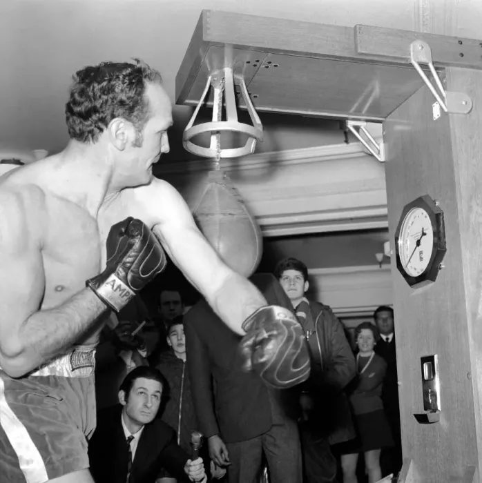 Framed Print : Someone will be on the receiving end from a Henry Cooper punch, and like it