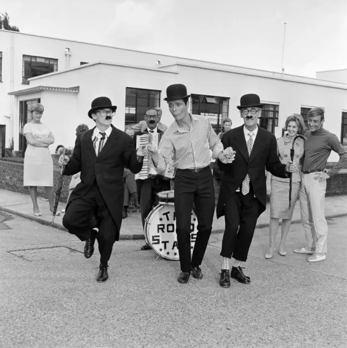 Framed Print : Recognise the bowler-hatted busker'? Its Cliff Richard Framed Print : Recognise the bowler-hatted busker'? Its Cliff Richard