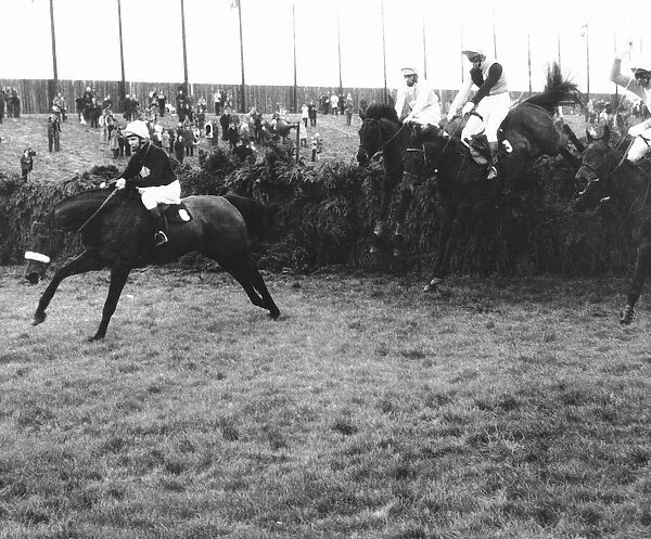 Red Rum and Brian Fletcher on their way to their first triumph in the Grand National at
