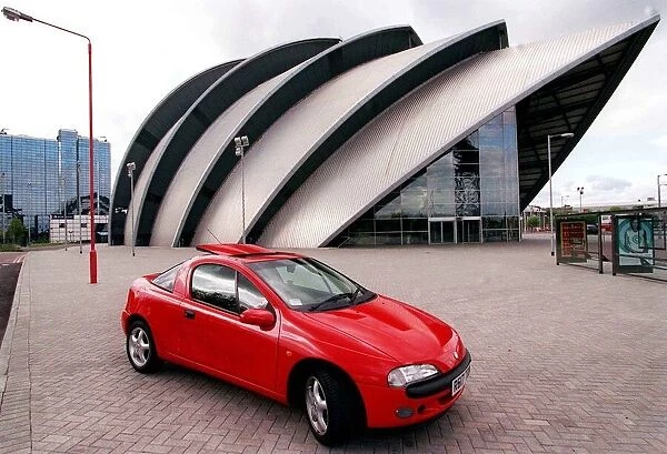 Red Vauxhall Tigra car May 1998 outside CLyde Concert Hall Aramadillo