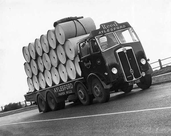 Reels of newsprint paper bound for the Daily Mirror printing presses in central London