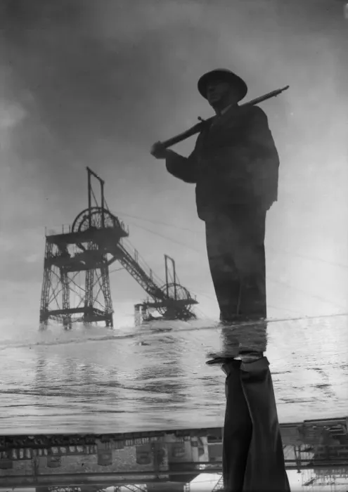 Framed Print : The reflection of a member of the Home Guard. Seen here in a puddle at an un-named Framed Print : The reflection of a member of the Home Guard. Seen here in a puddle at an un-named
