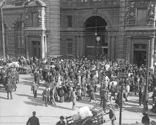 Refugees from the advancing Germans gather outside the Central Railway Station in Antwerp