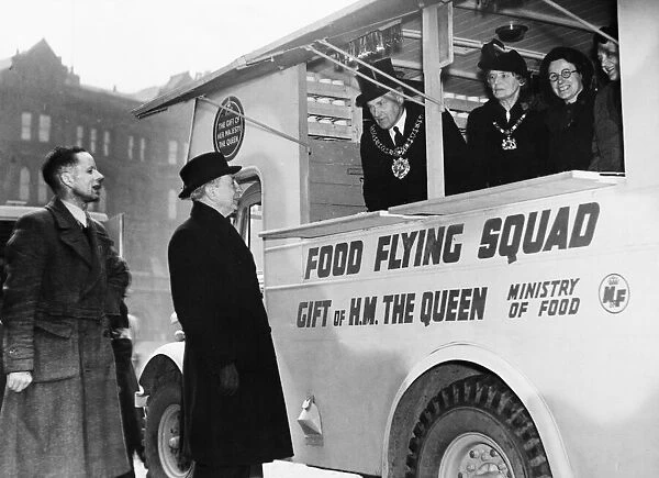 Regional Commissioner Harry Haig inspects a mobile canteen during the Second World War