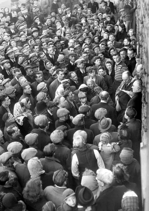 Framed Print : Relatives and friends wait anxiously for the latest news of the Easington Pit disaster