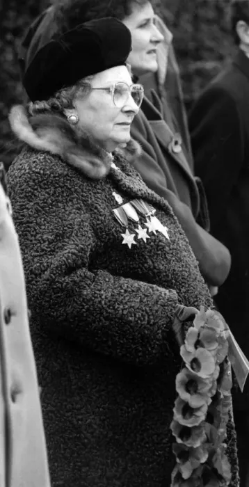 Framed Print : Remembrance Sunday in Rhyl, Denbighshire, Wales. Betty Hughes ready to lay her