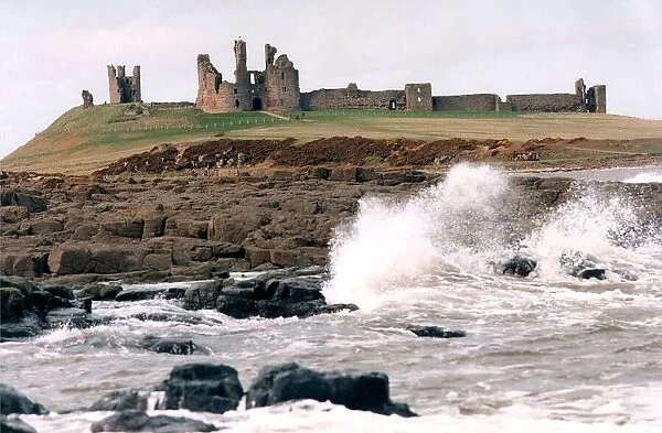 The remote and impressive ruins of Northumberlands Dunstanburgh Castle in July 1996