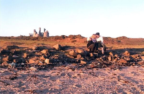 The remote and impressive ruins of Northumberlands Dunstanburgh Castle in April 1997