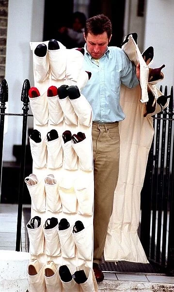 Removal men move Tony Blair MP into Downing Street from his home in Islington