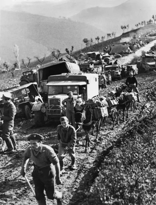 Framed Print : Repairing Fifth Army supply route. Transport held up while the road is repaired Framed Print : Repairing Fifth Army supply route. Transport held up while the road is repaired