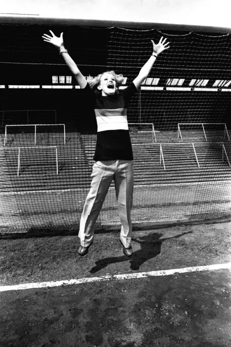 Framed Print : Reporter Claire models clothes for sale from footballer Malcolm MacDonald