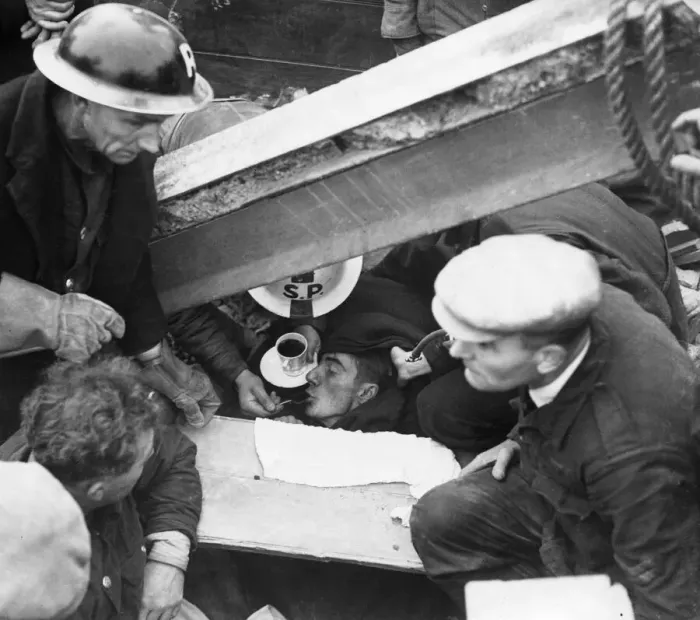 Framed Print : Rescue of man trapped in rubble at a London hostel, Westminster Bridge Road