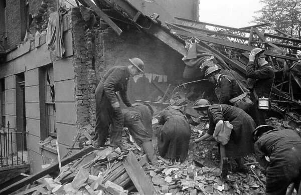 Rescue search in Camden Town after a daylight raid. 1940