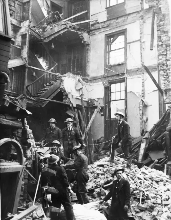 Framed Print : Rescue squad at work amongst the debris of a wrecked pub in South Street, Liverpool Framed Print : Rescue squad at work amongst the debris of a wrecked pub in South Street, Liverpool