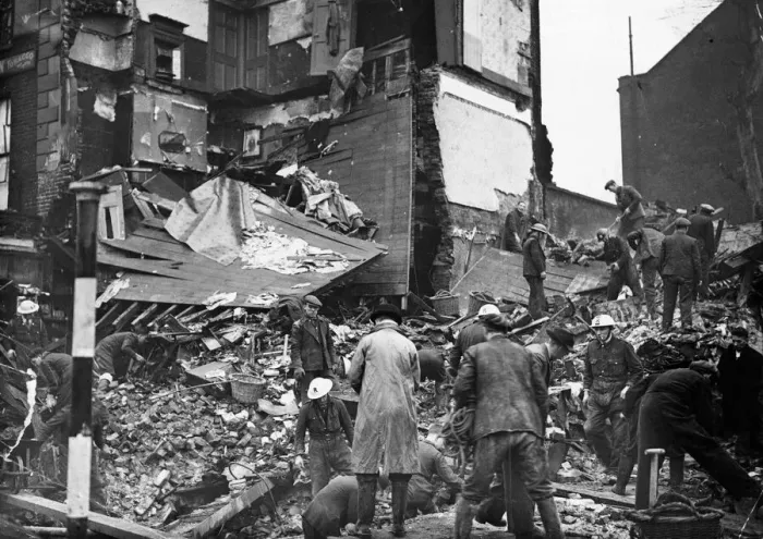 Framed Print : Rescue workers search debris at a bombed house in North West London. January 1941 Framed Print : Rescue workers search debris at a bombed house in North West London. January 1941