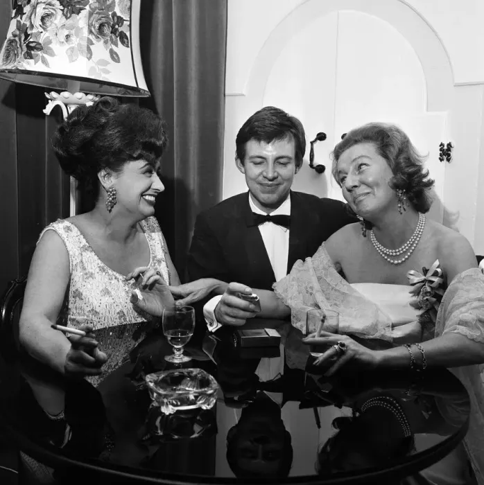 Framed Print : Two residents of Coronation Street'share a joke with royalty at a party in