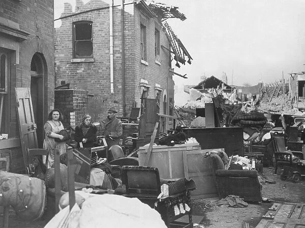 Residents from a town in the Midlands salvaging belongings after their home sustained